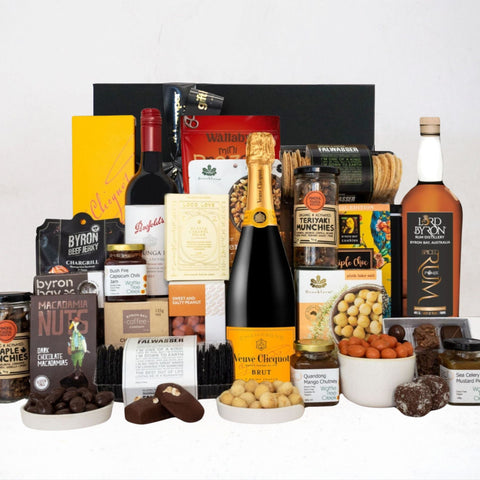 Corporate hamper with rum, veuve and red wine